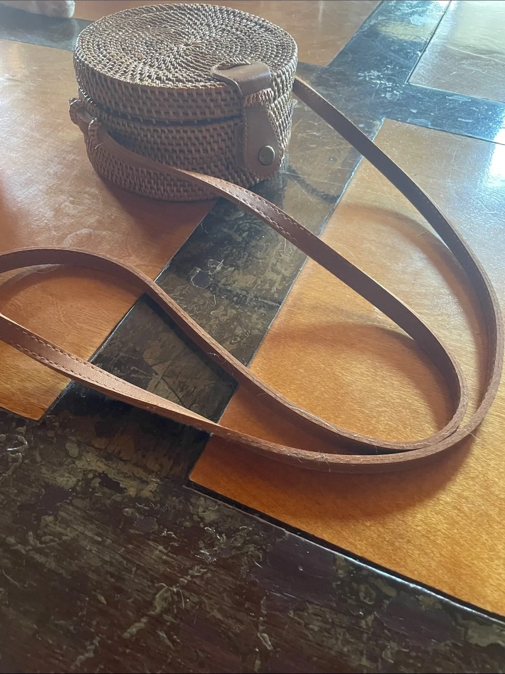 Round Woven Crossbody Bag in Brown
